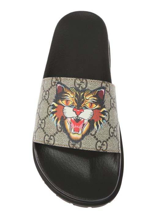 gucci sneakers tiger|Gucci tiger head slides.